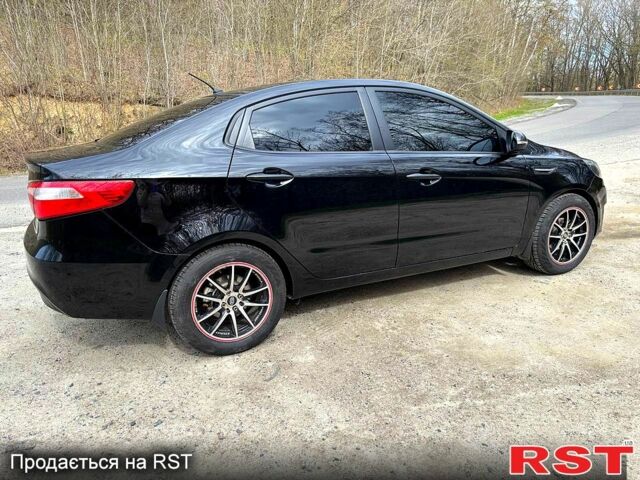 Черный Киа Рио, объемом двигателя 1.6 л и пробегом 154 тыс. км за 8000 $, фото 3 на Automoto.ua
