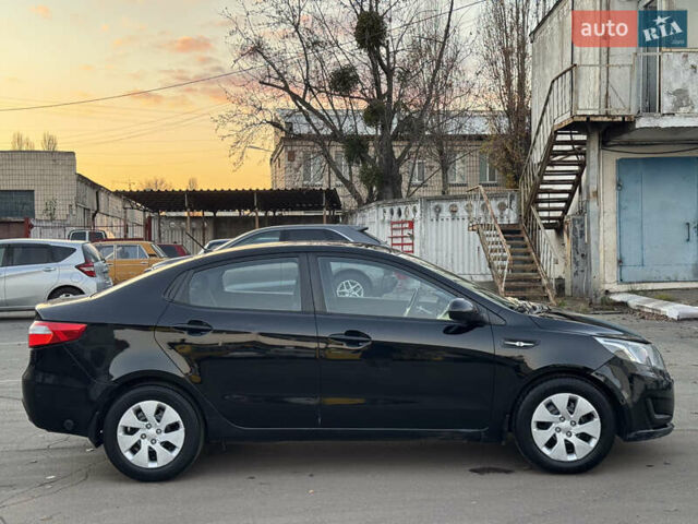 Черный Киа Рио, объемом двигателя 1.4 л и пробегом 305 тыс. км за 4950 $, фото 4 на Automoto.ua