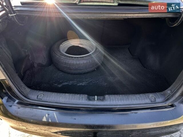 Чорний Кіа Ріо, об'ємом двигуна 1.59 л та пробігом 329 тис. км за 6000 $, фото 9 на Automoto.ua