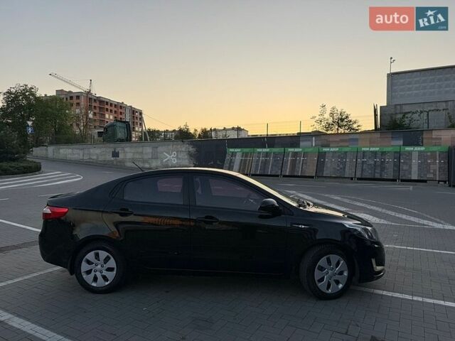 Черный Киа Рио, объемом двигателя 1.4 л и пробегом 90 тыс. км за 9000 $, фото 3 на Automoto.ua