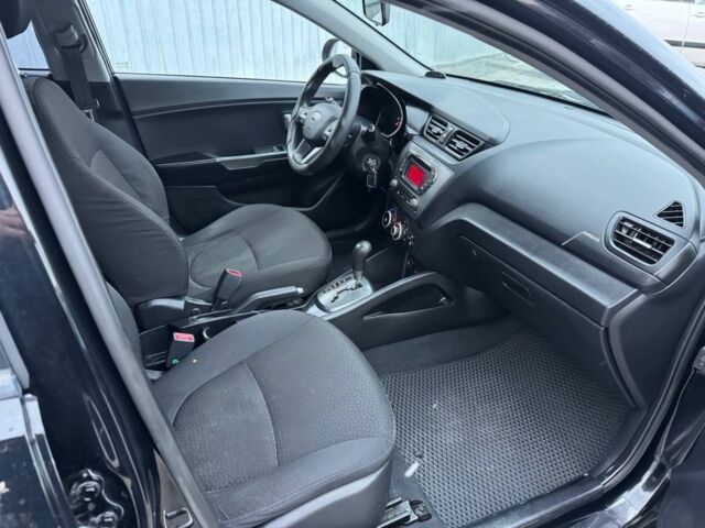 Чорний Кіа Ріо, об'ємом двигуна 1.4 л та пробігом 214 тис. км за 7700 $, фото 11 на Automoto.ua