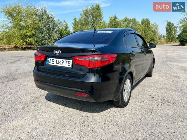 Чорний Кіа Ріо, об'ємом двигуна 1.6 л та пробігом 142 тис. км за 6800 $, фото 4 на Automoto.ua