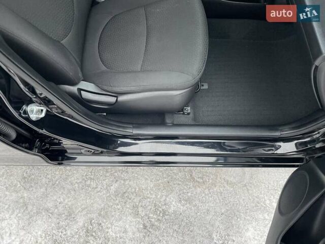 Черный Киа Рио, объемом двигателя 1.4 л и пробегом 124 тыс. км за 9350 $, фото 106 на Automoto.ua