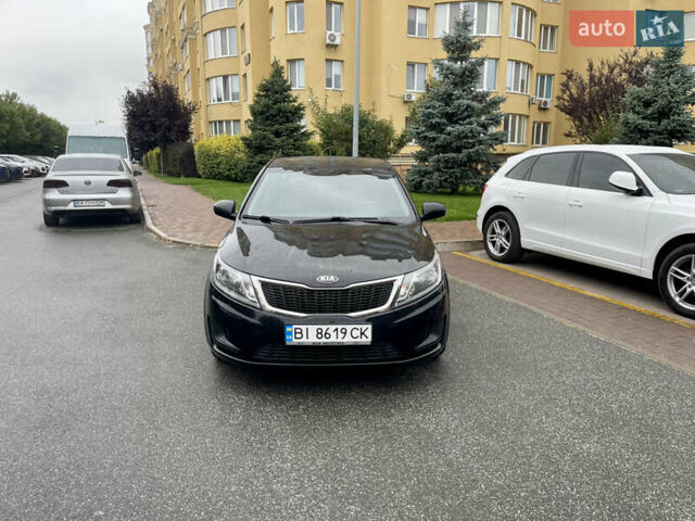 Чорний Кіа Ріо, об'ємом двигуна 1.4 л та пробігом 136 тис. км за 7950 $, фото 3 на Automoto.ua