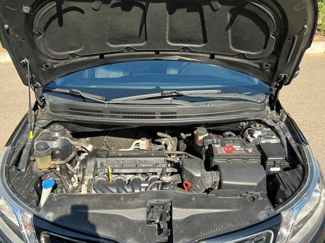 Чорний Кіа Ріо, об'ємом двигуна 1.59 л та пробігом 87 тис. км за 9499 $, фото 8 на Automoto.ua