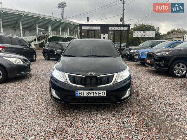 Черный Киа Рио, объемом двигателя 1.6 л и пробегом 170 тыс. км за 7999 $, фото 1 на Automoto.ua