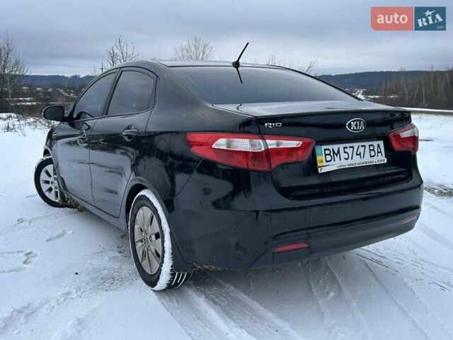 Черный Киа Рио, объемом двигателя 1.59 л и пробегом 107 тыс. км за 7950 $, фото 4 на Automoto.ua