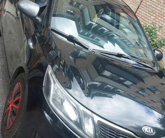 Черный Киа Рио, объемом двигателя 1.4 л и пробегом 320 тыс. км за 6200 $, фото 1 на Automoto.ua