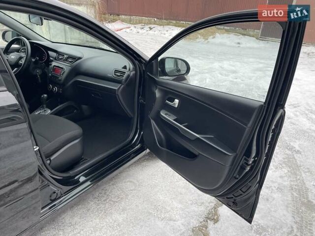 Черный Киа Рио, объемом двигателя 1.4 л и пробегом 124 тыс. км за 9350 $, фото 103 на Automoto.ua