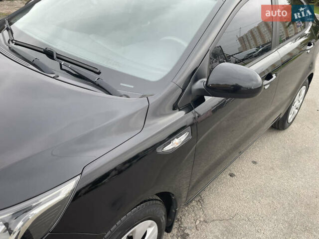 Черный Киа Рио, объемом двигателя 1.4 л и пробегом 136 тыс. км за 7700 $, фото 18 на Automoto.ua