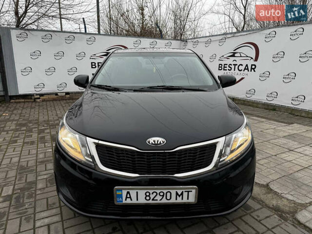 Черный Киа Рио, объемом двигателя 1.4 л и пробегом 185 тыс. км за 6999 $, фото 4 на Automoto.ua