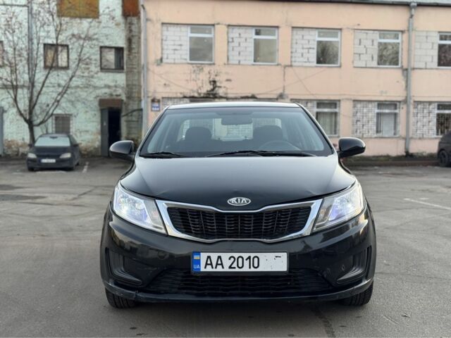 Черный Киа Рио, объемом двигателя 1.4 л и пробегом 305 тыс. км за 4750 $, фото 1 на Automoto.ua