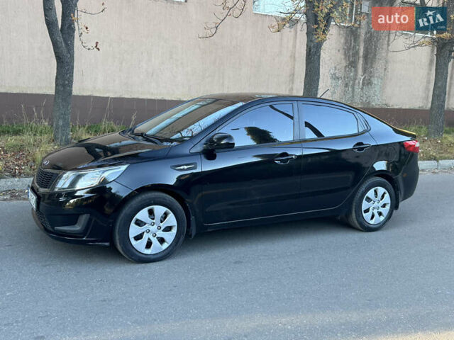 Черный Киа Рио, объемом двигателя 1.4 л и пробегом 135 тыс. км за 8000 $, фото 12 на Automoto.ua