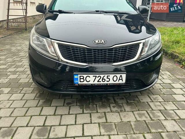 Чорний Кіа Ріо, об'ємом двигуна 1.4 л та пробігом 141 тис. км за 7200 $, фото 5 на Automoto.ua
