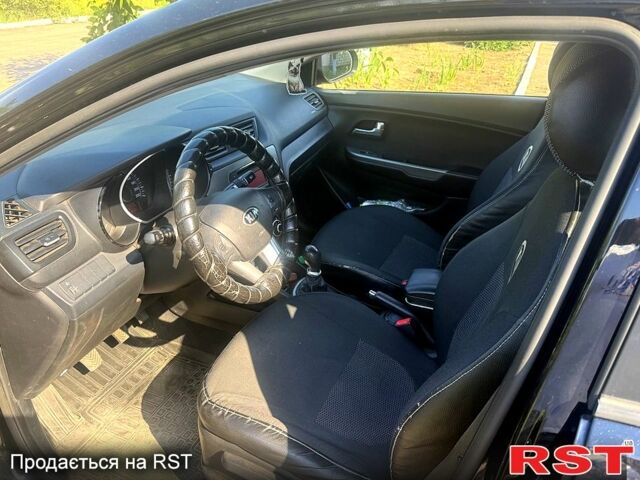 Черный Киа Рио, объемом двигателя 1.4 л и пробегом 109 тыс. км за 8100 $, фото 2 на Automoto.ua