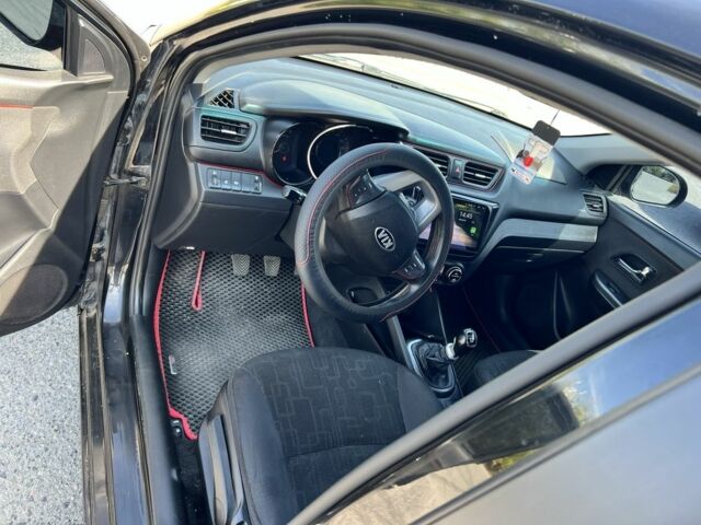 Черный Киа Рио, объемом двигателя 1.6 л и пробегом 142 тыс. км за 6412 $, фото 1 на Automoto.ua