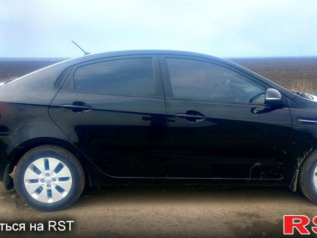 Чорний Кіа Ріо, об'ємом двигуна 1.6 л та пробігом 91 тис. км за 7800 $, фото 1 на Automoto.ua