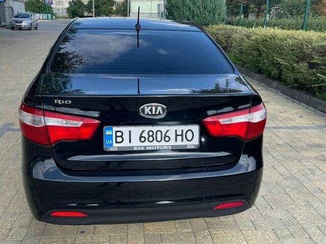 Черный Киа Рио, объемом двигателя 1.4 л и пробегом 247 тыс. км за 7800 $, фото 2 на Automoto.ua