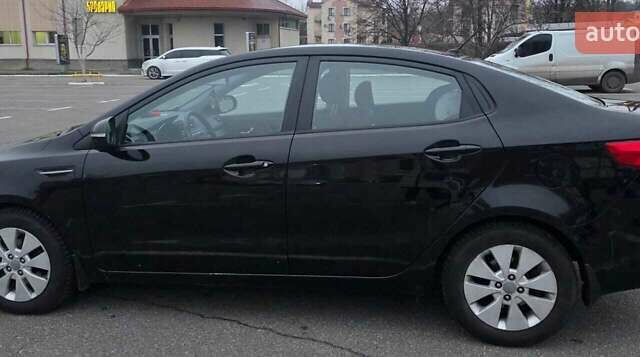 Черный Киа Рио, объемом двигателя 1.59 л и пробегом 150 тыс. км за 9000 $, фото 1 на Automoto.ua