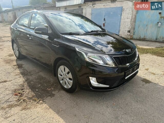 Черный Киа Рио, объемом двигателя 1.6 л и пробегом 61 тыс. км за 10300 $, фото 2 на Automoto.ua