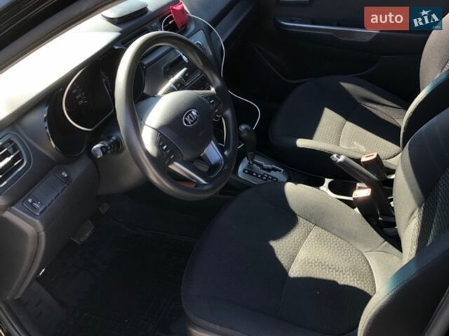 Чорний Кіа Ріо, об'ємом двигуна 1.4 л та пробігом 177 тис. км за 6800 $, фото 10 на Automoto.ua
