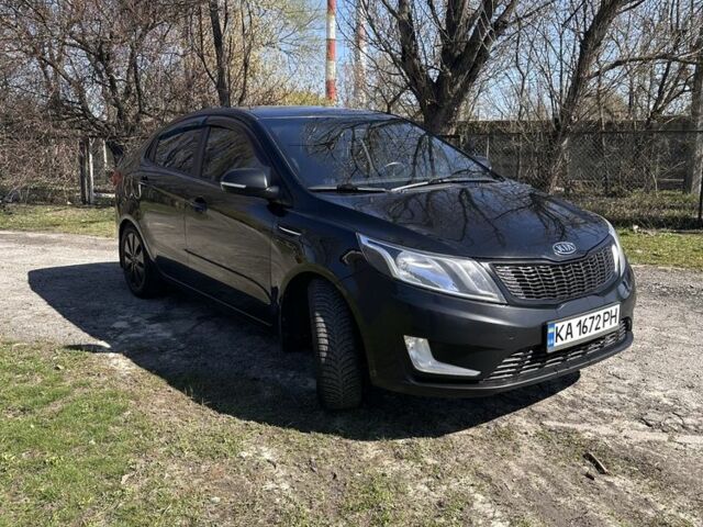 Чорний Кіа Ріо, об'ємом двигуна 1.6 л та пробігом 329 тис. км за 6000 $, фото 2 на Automoto.ua