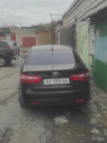 Черный Киа Рио, объемом двигателя 1.4 л и пробегом 120 тыс. км за 8500 $, фото 7 на Automoto.ua