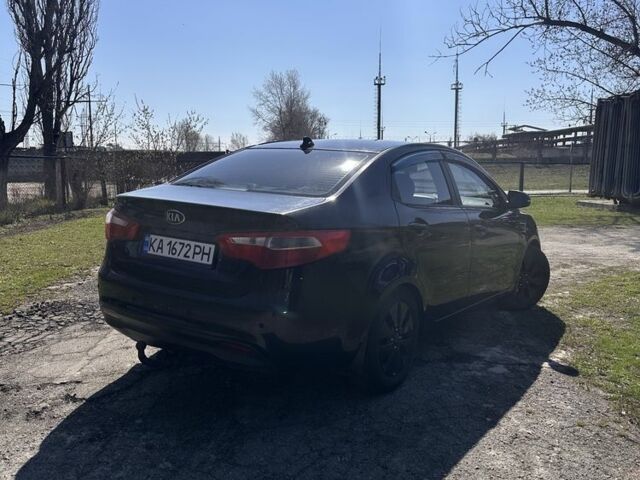 Чорний Кіа Ріо, об'ємом двигуна 1.6 л та пробігом 329 тис. км за 6000 $, фото 4 на Automoto.ua