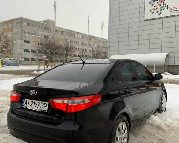 Черный Киа Рио, объемом двигателя 1.6 л и пробегом 270 тыс. км за 5850 $, фото 4 на Automoto.ua