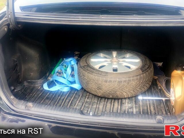 Чорний Кіа Ріо, об'ємом двигуна 1.6 л та пробігом 91 тис. км за 7800 $, фото 8 на Automoto.ua