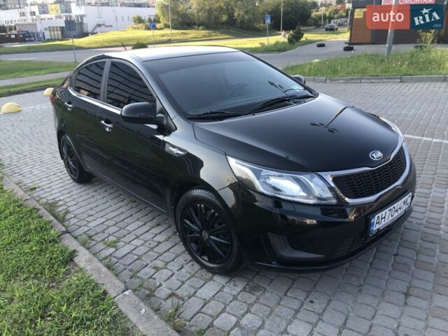 Чорний Кіа Ріо, об'ємом двигуна 1.4 л та пробігом 92 тис. км за 10000 $, фото 2 на Automoto.ua