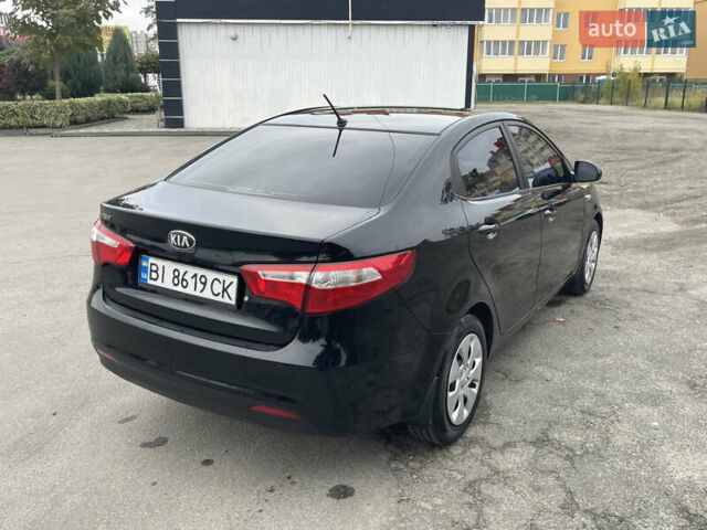 Черный Киа Рио, объемом двигателя 1.4 л и пробегом 136 тыс. км за 7700 $, фото 7 на Automoto.ua