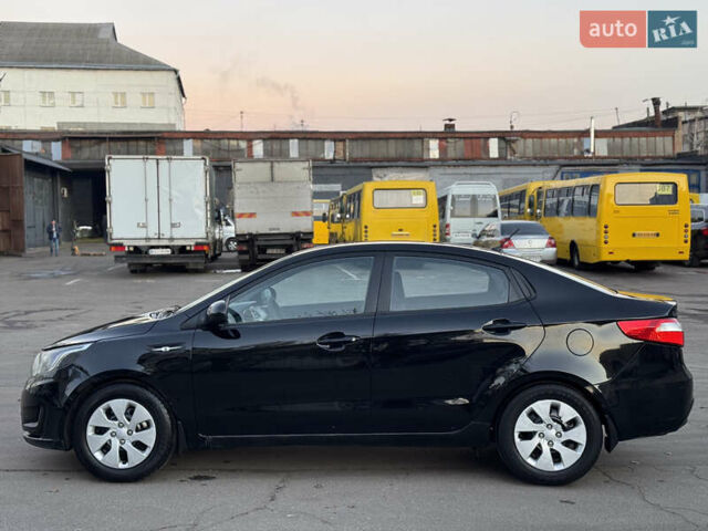Черный Киа Рио, объемом двигателя 1.4 л и пробегом 305 тыс. км за 4950 $, фото 9 на Automoto.ua