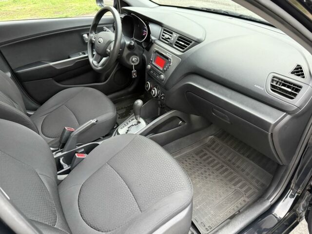 Чорний Кіа Ріо, об'ємом двигуна 1.4 л та пробігом 45 тис. км за 9800 $, фото 17 на Automoto.ua