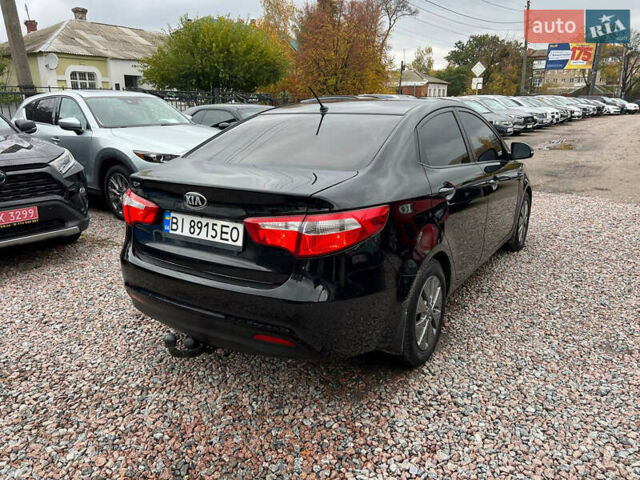 Черный Киа Рио, объемом двигателя 1.6 л и пробегом 170 тыс. км за 7999 $, фото 4 на Automoto.ua