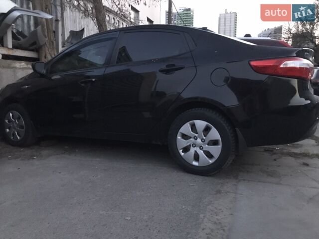 Черный Киа Рио, объемом двигателя 1.4 л и пробегом 102 тыс. км за 2600 $, фото 1 на Automoto.ua