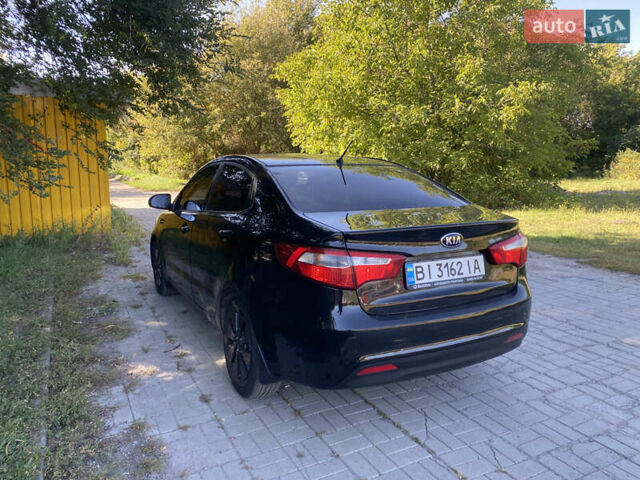 Черный Киа Рио, объемом двигателя 1.59 л и пробегом 194 тыс. км за 6700 $, фото 5 на Automoto.ua