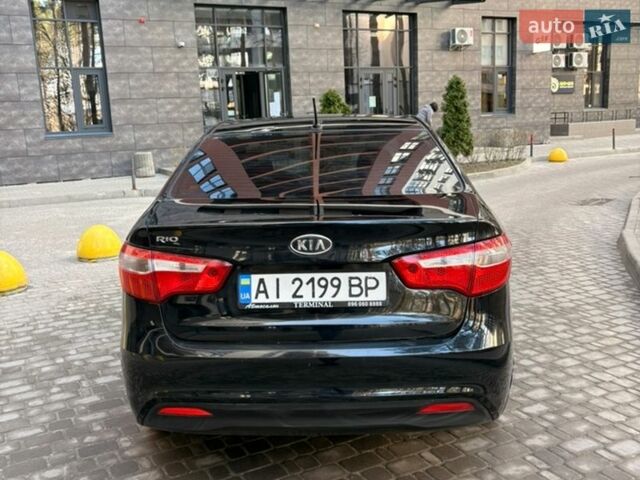 Чорний Кіа Ріо, об'ємом двигуна 1.6 л та пробігом 272 тис. км за 5950 $, фото 7 на Automoto.ua