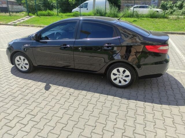 Черный Киа Рио, объемом двигателя 1.4 л и пробегом 186 тыс. км за 6800 $, фото 3 на Automoto.ua