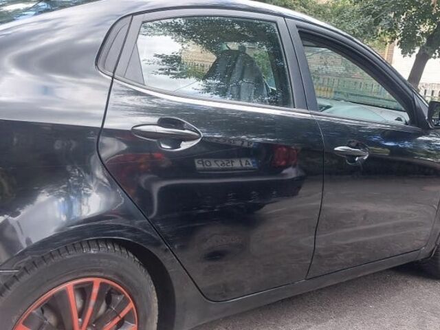 Черный Киа Рио, объемом двигателя 1.4 л и пробегом 320 тыс. км за 6200 $, фото 2 на Automoto.ua