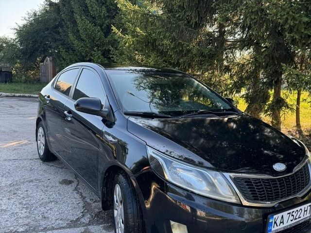 Чорний Кіа Ріо, об'ємом двигуна 1.4 л та пробігом 179 тис. км за 8000 $, фото 1 на Automoto.ua