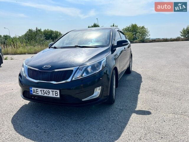 Чорний Кіа Ріо, об'ємом двигуна 1.6 л та пробігом 142 тис. км за 6800 $, фото 1 на Automoto.ua