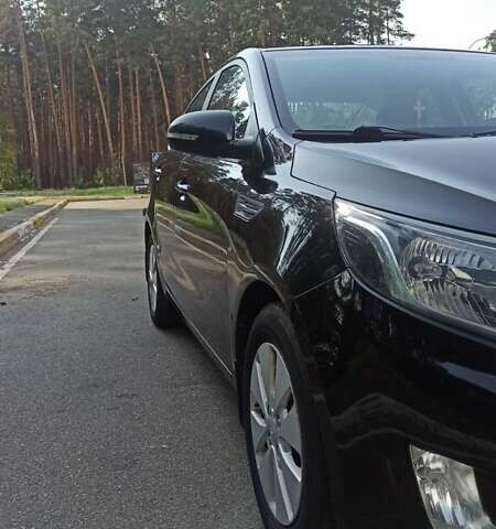 Черный Киа Рио, объемом двигателя 1.59 л и пробегом 150 тыс. км за 8300 $, фото 4 на Automoto.ua
