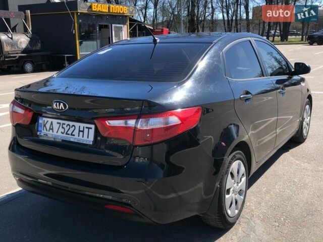 Чорний Кіа Ріо, об'ємом двигуна 1.4 л та пробігом 177 тис. км за 6800 $, фото 2 на Automoto.ua