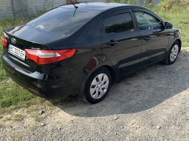 Черный Киа Рио, объемом двигателя 1.4 л и пробегом 212 тыс. км за 7800 $, фото 4 на Automoto.ua