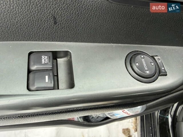 Чорний Кіа Ріо, об'ємом двигуна 1.4 л та пробігом 123 тис. км за 7300 $, фото 19 на Automoto.ua
