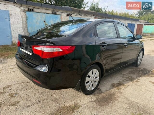 Черный Киа Рио, объемом двигателя 1.6 л и пробегом 61 тыс. км за 10300 $, фото 6 на Automoto.ua
