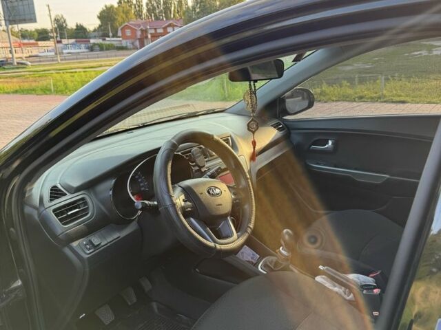 Черный Киа Рио, объемом двигателя 1.4 л и пробегом 185 тыс. км за 5777 $, фото 3 на Automoto.ua