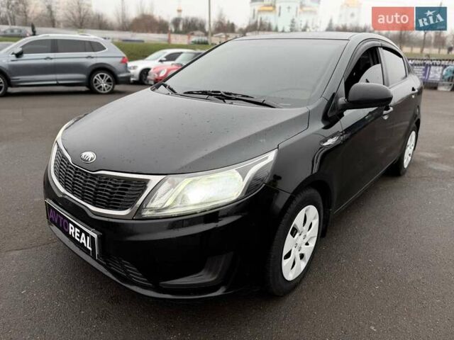 Черный Киа Рио, объемом двигателя 1.4 л и пробегом 220 тыс. км за 8200 $, фото 9 на Automoto.ua