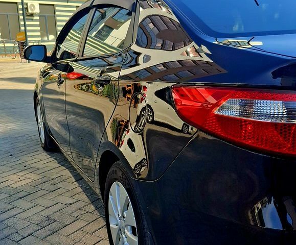 Черный Киа Рио, объемом двигателя 1.6 л и пробегом 130 тыс. км за 8750 $, фото 1 на Automoto.ua